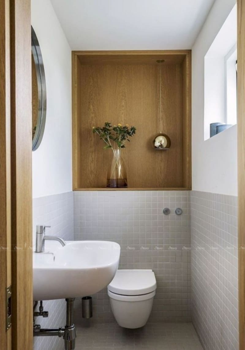 Nhà vệ sinh kết hợp ốp gạch và nội thất âm gỗ