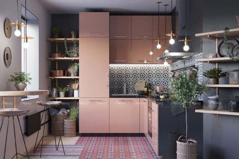 không gian khu bếp được thiết kế với tone màu hồng pastel với đá ốp bếp hoa văn độc đáo
