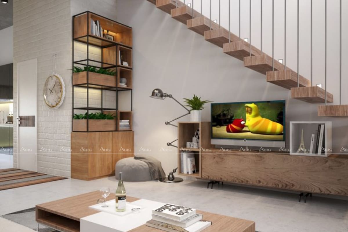 Bày trí nội thất phòng khách với tủ TV dưới cầu thang giúp tối ưu không gian căn nhà.