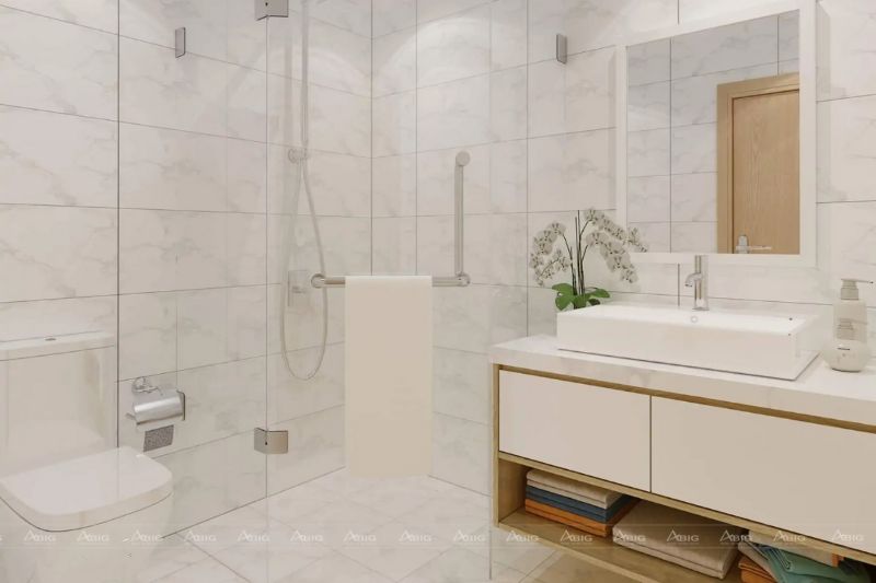 Phòng tắm nhỏ gọn với gạch lát giúp giữ vẻ sáng bóng cho nhà vệ sinh