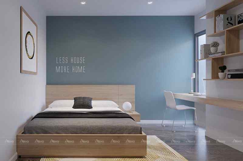 Phòng ngủ phụ với mảng tường sơn xanh và họa tiết chữ đem lại sự trẻ trung